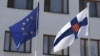 Flags of the European Union and Finland fly outside the Finnish Embassy in Moscow. (file photo)