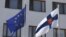 The flags of the European Union and Finland fly outside the Finnish Embassy in Moscow. (file photo)