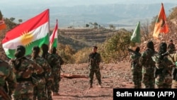 Luptătoare peșmerga kurde din partidul separatist PAK, din Iran, într-o imagine de arhivă.