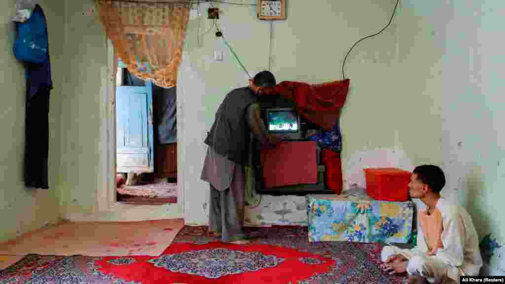 Karim turns on the television in his sparsely furnished home in Kabul, where he lives with his five children, three of whom are disabled.&nbsp;Handouts from the World Food Program (WFP) have been crucial for his family. &quot;I&#39;m so worried about what will happen next,&quot; he said.&nbsp; &nbsp;