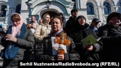 UOC supporters gather at the Kyiv-Pechersk Lavra in Kyiv on March 30.