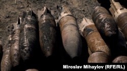 Remains of charred shells from the EMCO munitions depot near Karnobat, Bulgaria, after its previous fire last July.