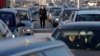 Vehicles traveling from Kosovo wait in line at a Kosovo-Serbia border crossing in Merdare earlier this month. 