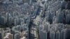 FILE PHOTO: An aerial view shows apartment complexes in Seoul, South Korea, October 5, 2020. REUTERS/Kim Hong-Ji/File Photo