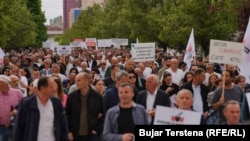 Fotografi nga protesta e mbajtur nga Sindikata e Bashkuar e Arsimit dhe Shkencës (SBASHK) në Prishtinë më 1 maj 2024.