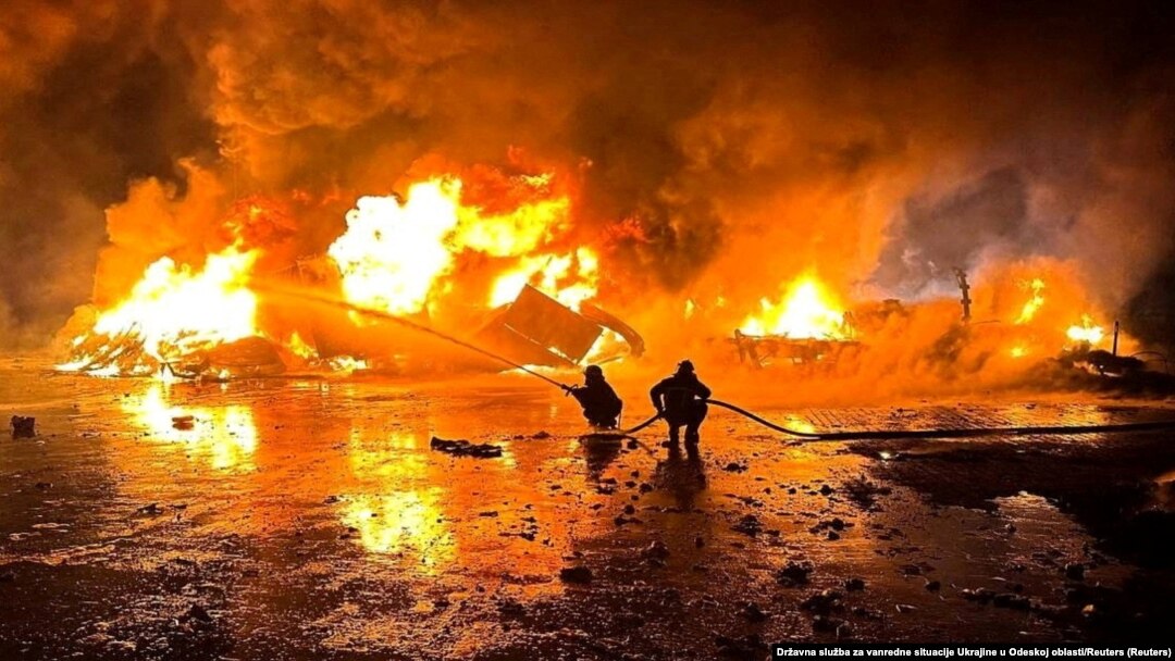 Firefighters work at a port compound on the Danube River damaged by a Russian drone strike in Ukraine's Odesa region in October.