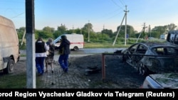 A view shows destroyed vehicles following what was said to be Ukrainian shelling in the town of Shebekino in the Belgorod region in an image released on May 31.