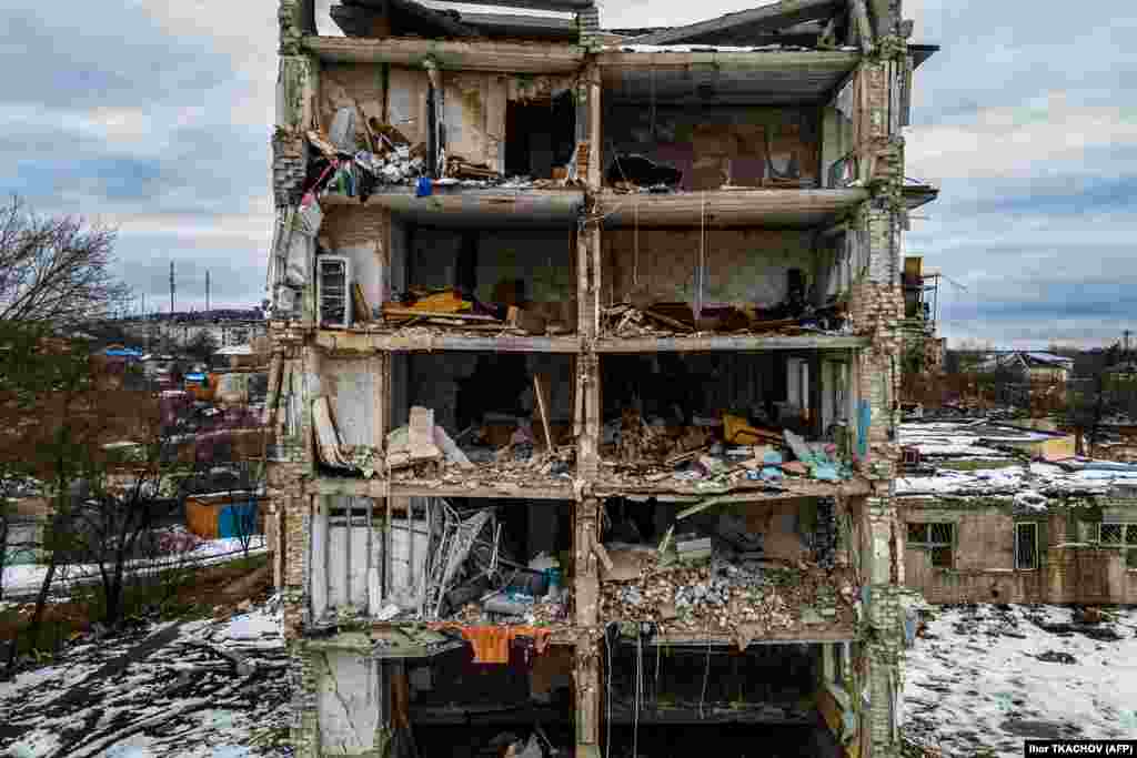 An aerial view shows a residential building damaged by shelling in Izyum, Kharkiv region.