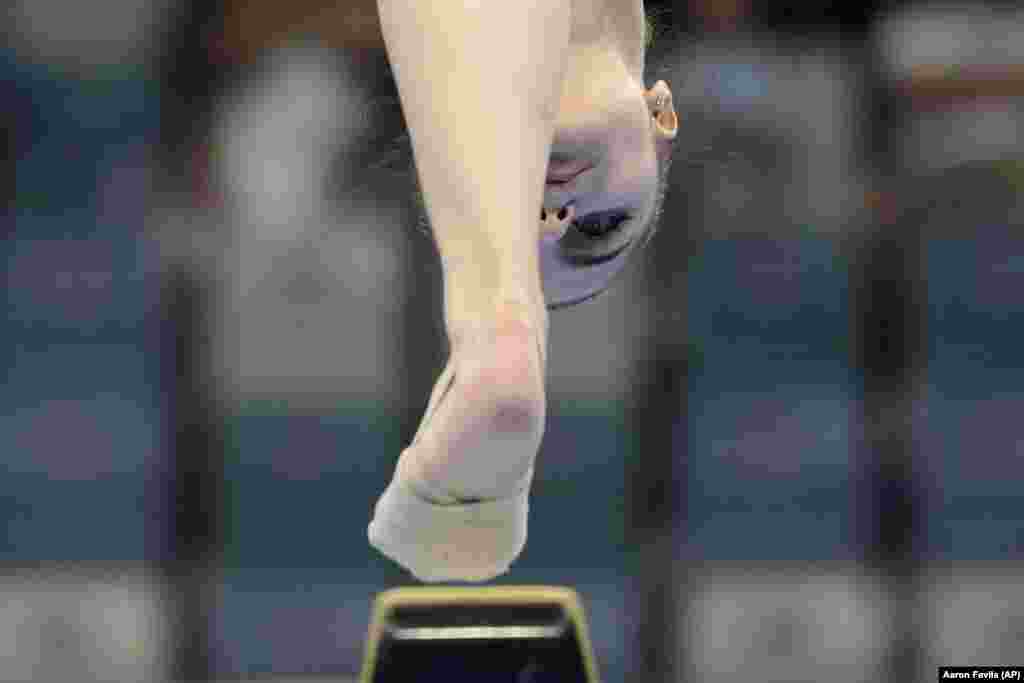 Darya Yassinskaya of Kazakhstan competes on the balance beam at the women&#39;s team artistic gymnastics event of the 19th Asian Games in Hangzhou, China, on September 25.