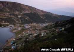 The camp of the White Brotherhood around a hut in the Rila Mountains on August 18.