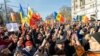 People take part in an anti-government protest organized by the Sor Party in Chisinau on March 12.