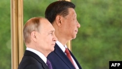Лидерите на Кина и Русија, Си Џинпинг и Владимир Путин, 16 мај 2024 година