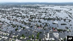Город Олешки на левом берегу Херсонской области, затопленный в результате уничтожения Каховской ГЭС. Украина, 10 июня 2023 года