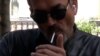 Sweden, which has the lowest rate of smoking in the EU, is close to declaring itself “smoke free”, man smoking a cigarette, June 2023.