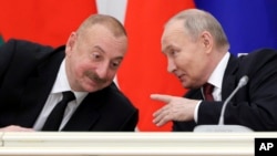 Азербайжандын жана Орусиянын президенттери Илхам Алиев менен Владимир Путин. Архив