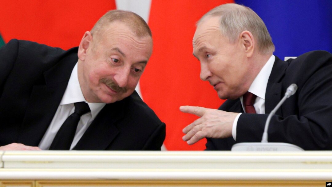 İlham Əliyev və Vladimir Putin (Arxiv fotosu)