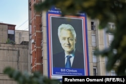 A portrait of former U.S. President Bill Clinton looms over the boulevard named in his honor in Pristina.