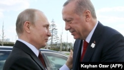Одна з попередніх зустрічей Володимира Путінв (л) і Реджепа Ердогана
