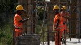 Bihac, Bosnia and Herzegovina -- Foreign workers on a construction site in the north of Bosnia