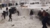 An avalanche destroyed several buildings in Khorugh, killing eight people.