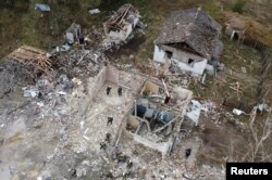 Место российского удара по Грозе во время поисково-спасательных работ 6 октября