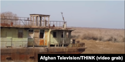 A rusting boat on Uzbekistan's Aral Sea, the inland lake that the Amu Darya used to flow into. Massive diversion of river waters for irrigation of cotton fields under the Soviet Union caused the lake to shrink to a fraction of its former size. (file photo)