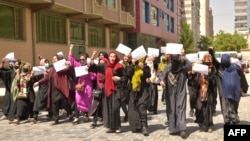 Afghan women march for their rights in Kabul on April 29.