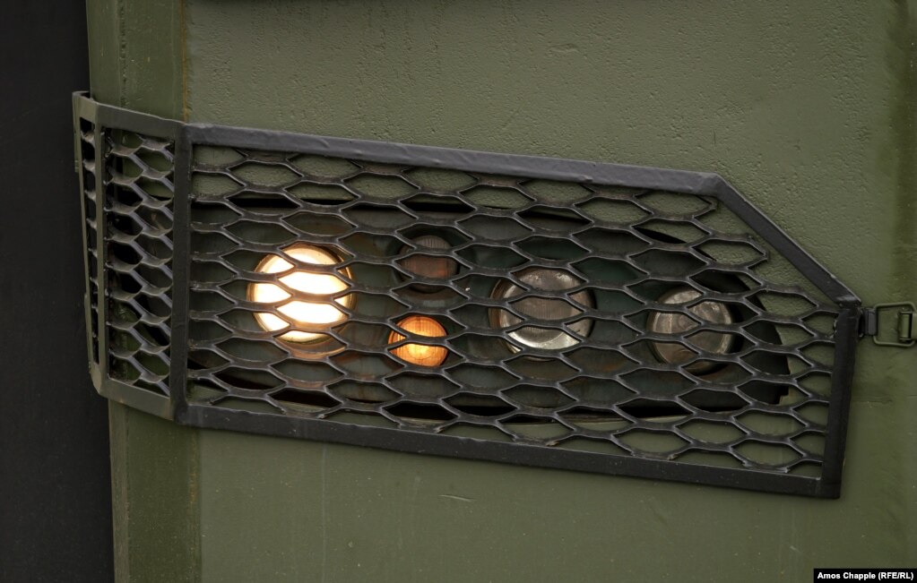 A metal net protects the hospital's mobile lights