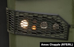 A metal grille protects the headlights of the Oleg Gubal mobile hospital.