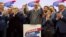 Serbian President Aleksandar Vucic celebrates on stage at the Serbian Progressive Party (SNS) headquarters following exit-poll results of the parliamentary elections in Belgrade on December 17.
