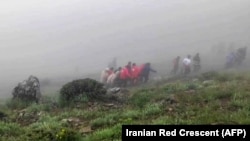 Rescue crews work at the crash site of Iranian President Ebrahim Raisi's helicopter on May 20.