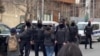 Police in the Azerbaijani capital, Baku, during a raid of the Toplum TV offices on March 6.