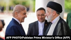  ابراهیم رئیسی  رئیس جمهور ایران  در دیدار با شهباز  شریف  صدر اعظم پاکستان 