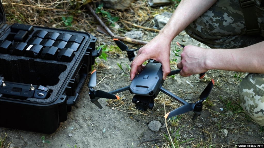 A Ukrainian soldier in Kherson prepares to operate a commercial DJI Mavic drone in June. 