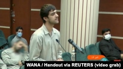 Mohammad-Mehdi Karami speaks in a courtroom in December 2022, a month before before being executed by hanging for allegedly being involved in the death of a security officer during nationwide protests.