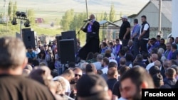 Armenia - Archbishop Bagrat Galstanian speaks during a rally in Sotk, June 5, 2024.