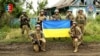 Украин аскерлери орустардан бошотулган кышктардын биринде. 