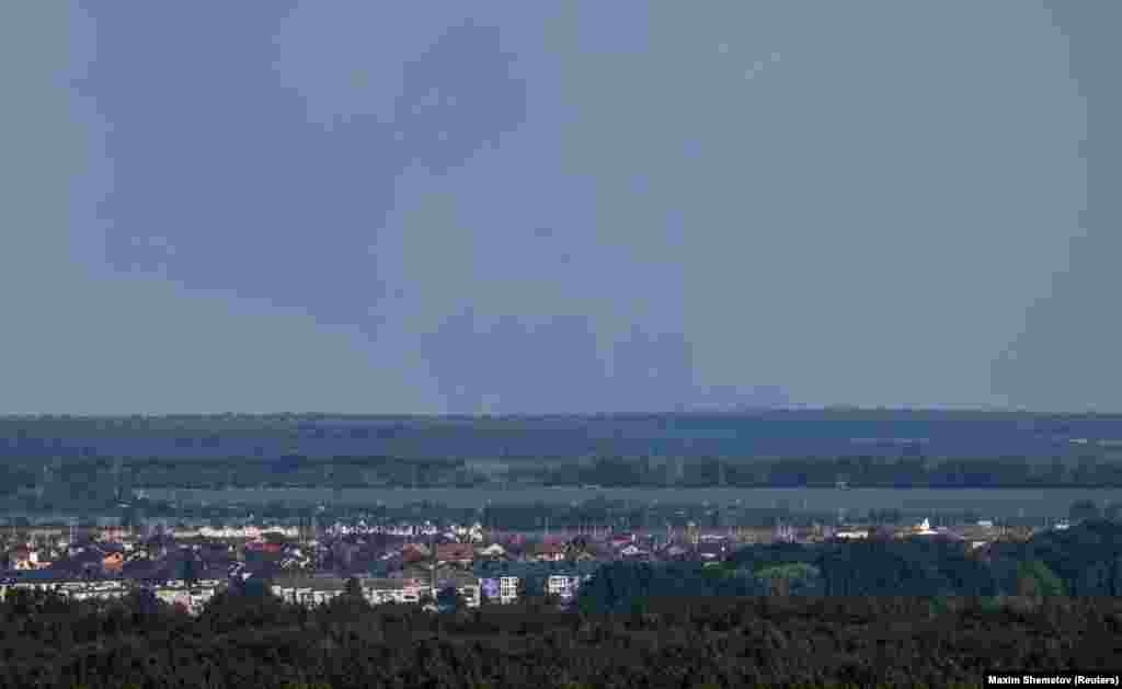 Smoke rises above Shebekino, as seen from the city of Belgorod on June 7. Russian journalist Igor Yakovenko told Current Time that Russian President Vladimir Putin &quot;is not in control of the situation in the Belgorod region.&quot; He added that, amid the rise of competing armed factions, &quot;we are talking about the birth of unrest in Russia.&quot; &nbsp;