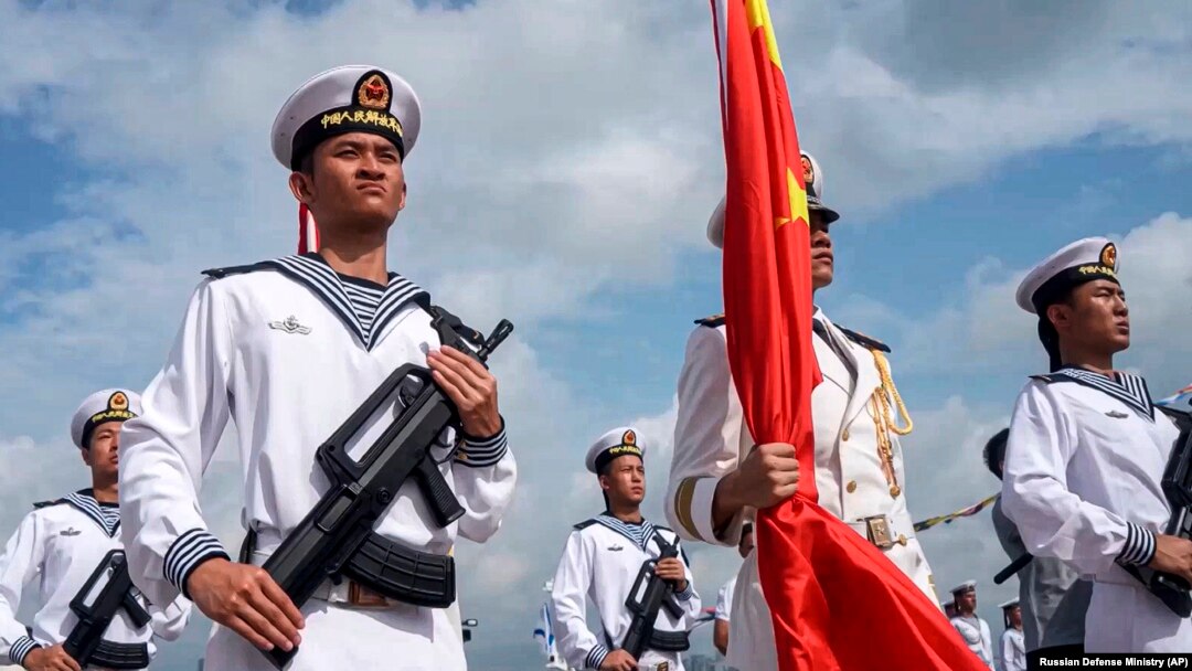 Chinese and Russian naval forces conduct joint exercises near Zhanjiang, China, on July 15. 