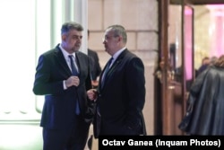 The swap of Marcel Ciolacu (left) and Nicolae Ciuca as prime minister is now on hold.