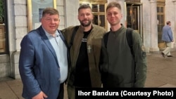 Ihor Bandura (left), Mark Serhiyev, and Anton Serhiyev in Washington, DC.