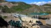 A view of an Azerbaijani checkpoint recently set up at the entry of the Lachin corridor, Nagorno-Karabakh's only land link with Armenia, by a bridge across the Hakari river, May 2, 2023. 