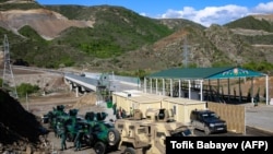 A view of an Azerbaijani checkpoint set up at the entry of the Lachin corridor, by a bridge across the Hakari river, May 2, 2023. 
