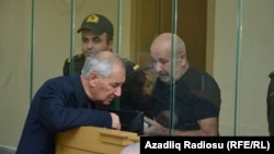 Vagif Khachatrian (right) attends a military court in Baku on October 13. 