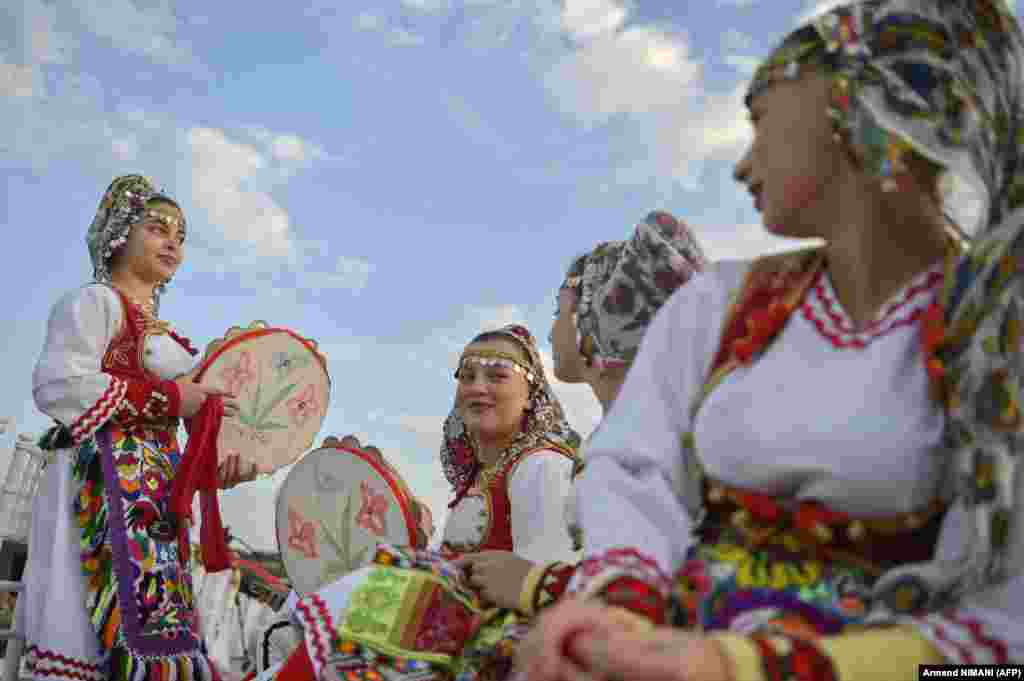 Girls dressed in traditional costumes wait for their performance to start. The festival is the first of its kind in Kosovo. Ulpiana was an important Roman city in the Balkans and was part of the Roman province of Dardania. Its historical importance stems from its role as a center of Roman governance, trade, and culture in the region. &nbsp;