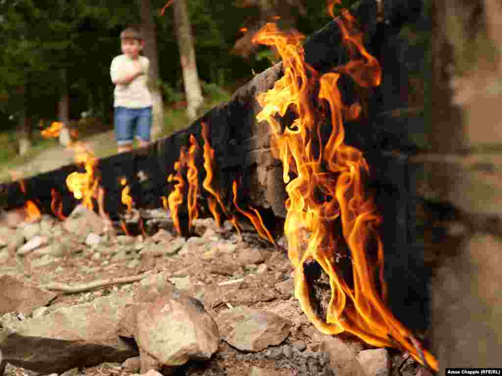 Gas fires emanate from the ground on the outskirts of Andreiasu de Jos in Romania&rsquo;s Vrancea County. Several myths seek to explain the unearthly phenomenon, including one of a local hero decapitating a multiheaded, fire-breathing dragon whose mouths still flicker with fire from beneath the ground.&nbsp; &nbsp;