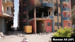 Ndërtesa të shkatërruara nga luftimet në Kartum të Sudanit. Prill, 2023.