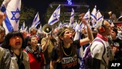 Демонстрантите скандират по време на протест срещу израелското правителство в Йерусалим на 31 март 2024 г.