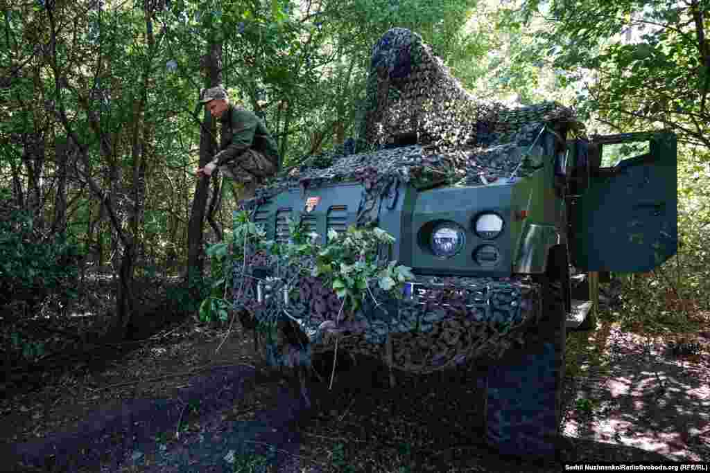 The Bohdana crew waits for commands in a forest at an unidentified location in eastern Ukraine on September 13. &nbsp;