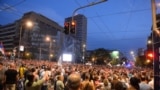 Protesters rally against violence in Belgrade on June 9.